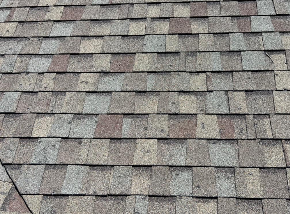 Before photo of hail-damaged roofing in Denver, CO